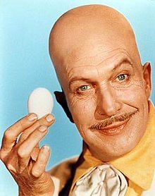 Holy roasted omelette, Batman!  It’s Egghead, the bald goofy egg-themed villain from the 60s Batman TV series, as portrayed by legendary horror actor Vincent Price!