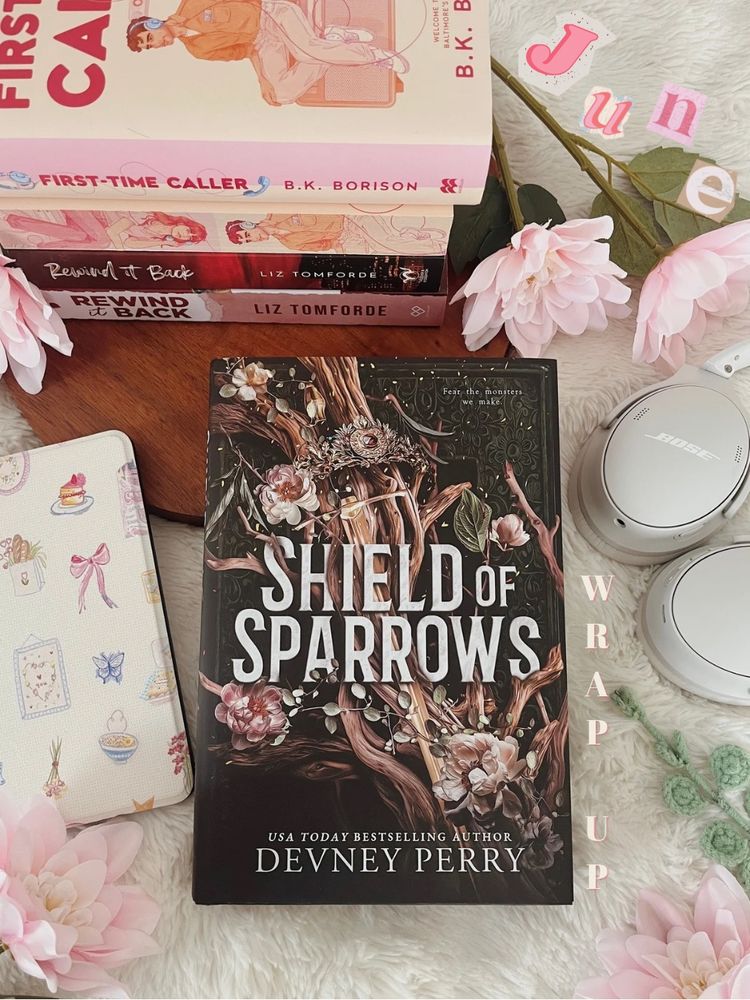 [Text] June Wrap Up —

Book stack:
• Two First Time Caller editions by B.K Borison, Sprayed Edges from TheWork
• Two Rewind It Back editions by Liz Tomforde, city skyline and new red U.S sprayed edges 
• Shield of Sparrows — Devney Perry

Surrounded by pink flowers, my floral kindle case and Bose headphones