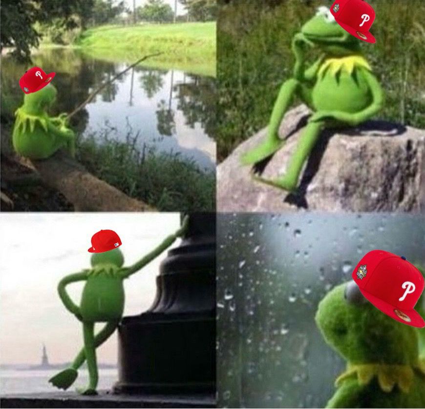 four pane meme of kermit the frog:
-fishing in a pond
-sitting on a rock posed like rodin’s “thinker”
-standing next to a pillar staring out at the statue of liberty 
-staring wistfully out a window that has raindrops on it

all four panes have crude phillies hats