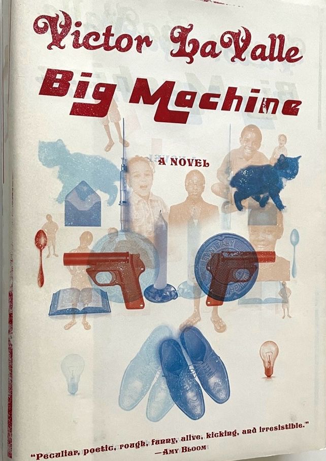 Book cover of Big Machine by Victor LaValle. The author and title are at the top in red font. Underneath and spread over the entire cover are super imposed images. Several Black kids (most smiling or laughing but one (a teenager maybe) has a serious look on their face). In light blue: a small cat on each side of the cover, an envelope, an open book, a candle, hypodermic needle, a red spoon on the left, a blue spoon on the right, two coins, a pair of shoes. In the center, in red, on top of the light blue images, are two red handguns, muzzles facing in opposite directions. At the bottom left a blue lightbulb. Bottom right a red lightbulb.