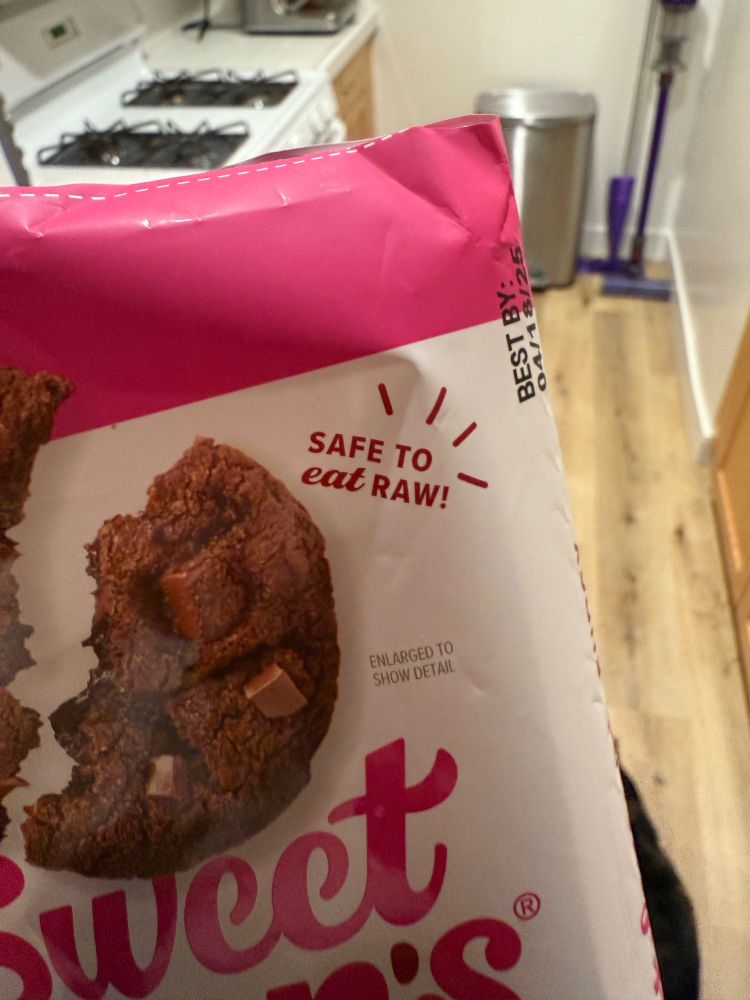 Package of cookie dough that reads “safe to eat raw!”