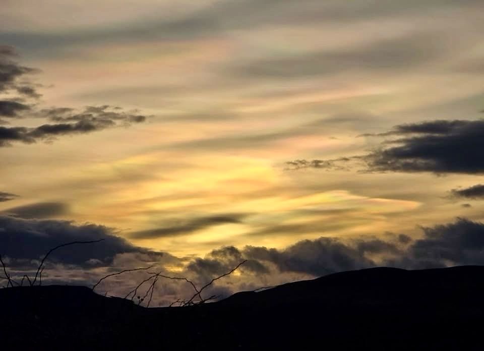A picture of nacreous clouds taken in the Scottish Highlands. 