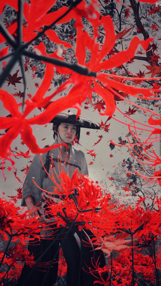 Ghost of Yotei

The image is primarily dominated and framed by red flowers, as Atsu charges through them. Determined. She only has her goal in mind. 

The image is taken from a low angle, from within the flowers themselves. 