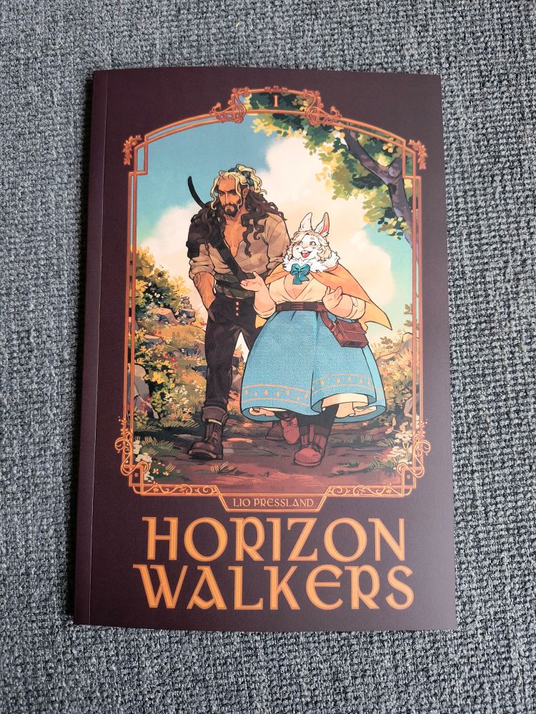 The cover of the Horizon Walkers comic by Lio Pressland. It shows the two main characters walking along a road. Rosemary is a fat woman with bunny-like features, and Cairn is a tall buff grumpy looking fellow with long curly hair.