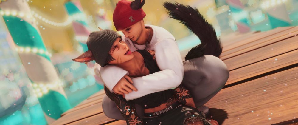Two miqo'te boys are on a pier, in the region of Living Memory in FFXIV. One, the speaker, is sitting at the edge with his feet in the water while the other is crouching behind, his arms embracing the first's shoulders and chest. The sitting miqo'te looks lovingly to the crouching one, blinking with a single eye while having his tongue playfully sticking out. The crouching one watches the other's playful side with an amusing expression, smiling at them.