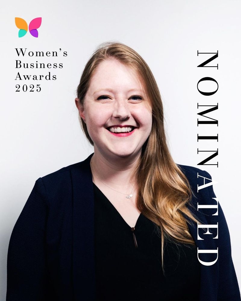 Mel Phillips smiles at the camera. Next to her is the word 'Nominated' in bold lettering, with the Women's Business Awards 2025 logo in the top left corner.