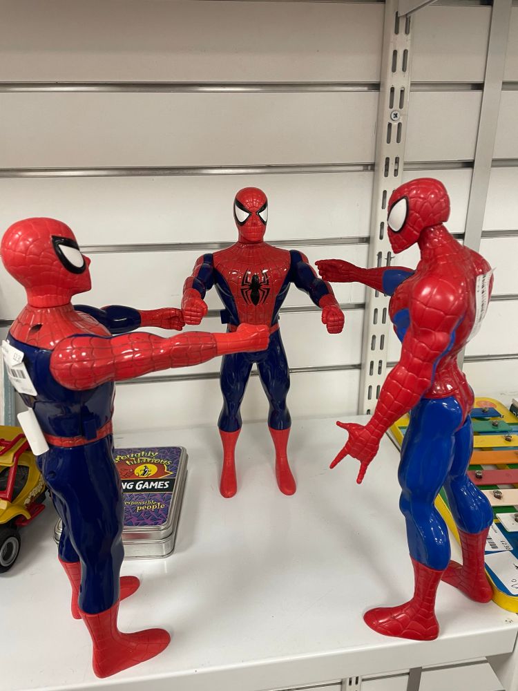 Three Spider-Man figurines set up like the “Spider-Man Pointing at Spider-Man" meme 