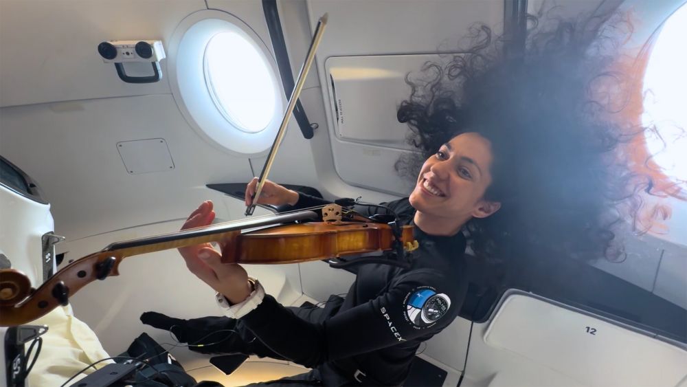 Astronaut Sarah Gillis plays a Star Wars tune on her violin