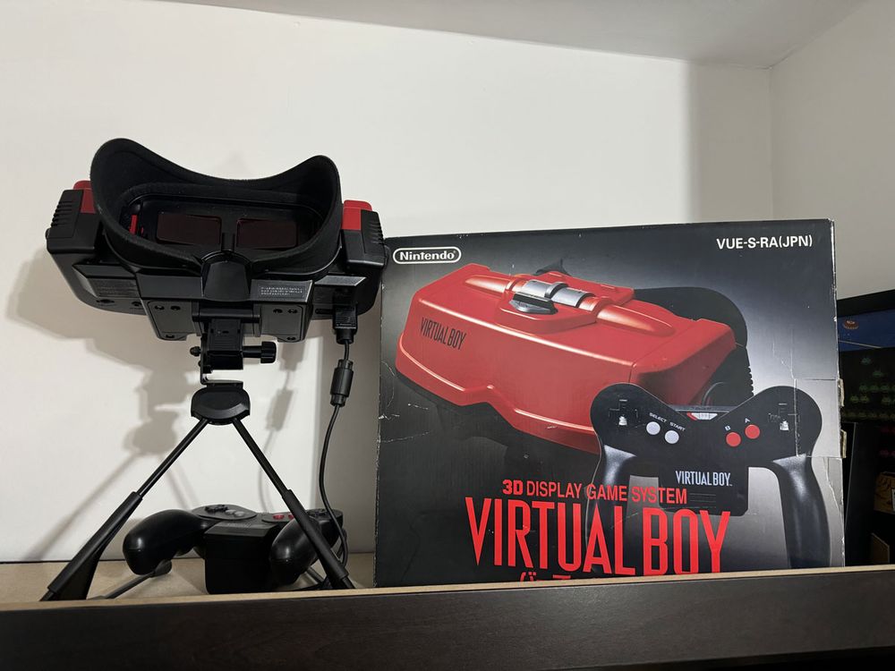 Nintendo Virtual Boy system and its box on a bookcase