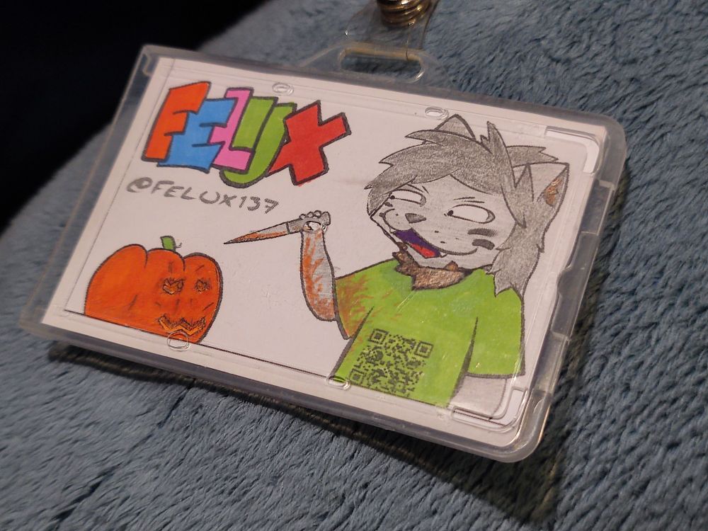 Coloured drawing of a cat stabbing the shit out of a pumpkin