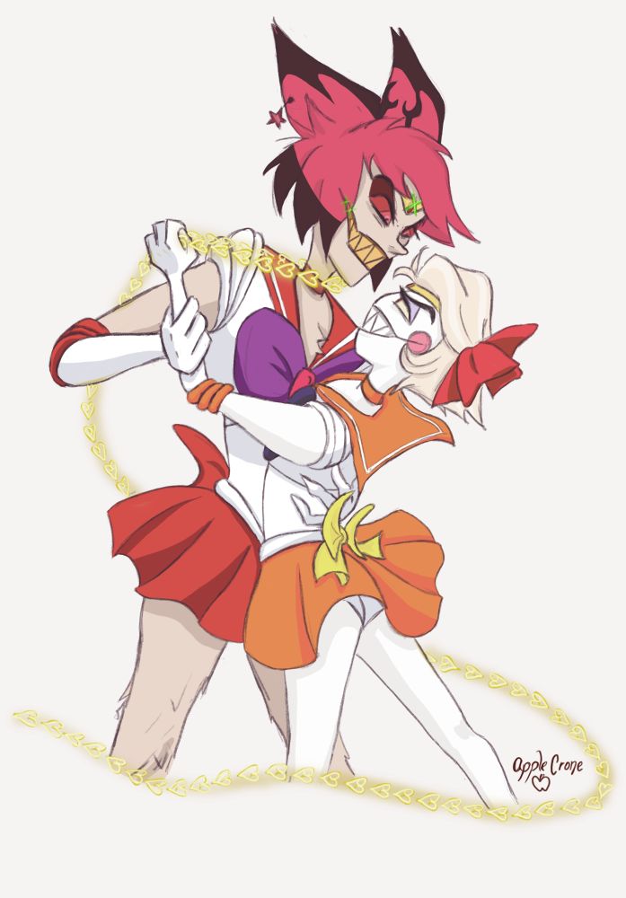 Alastor and Lucifer are dressed up as Sailor Mars and Sailor Venus respectively. Lucifer has the Venus Love Me chain wrapped around Alastor's neck while wearing a shit eating grin and a furious Alastor grips his waist and arm. 