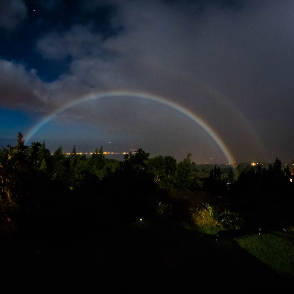 Magical moonbow glowing over Kihei, Maui, under a starry night sky. A rare and stunning natural phenomenon captured beautifully. #prettypictures #arne'spictures #photography #Maui #moonbow #nature #nightphotography #Hawaii #beautifuldestinations #stunningviews