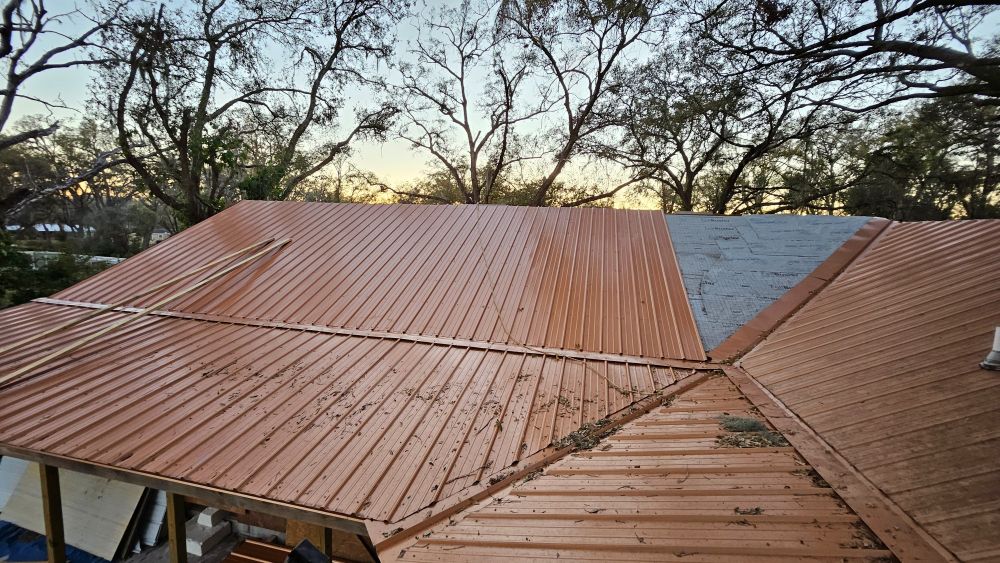 A partially completed metal roof