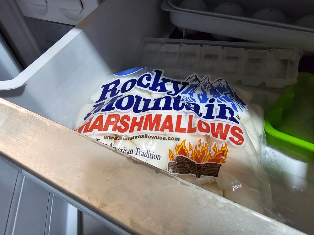 A bag of marshmallows in a freezer