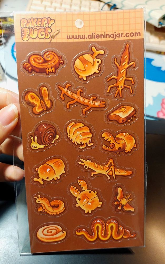 Sticker sheet of different bakery shaped bugs like bread beetle, worms, toast 