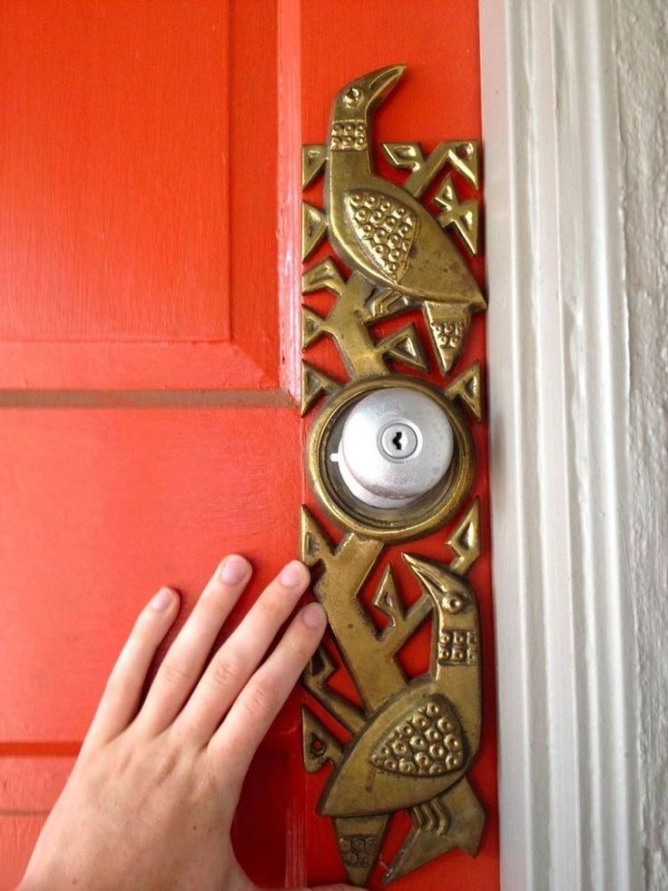 Bird door decor in brass