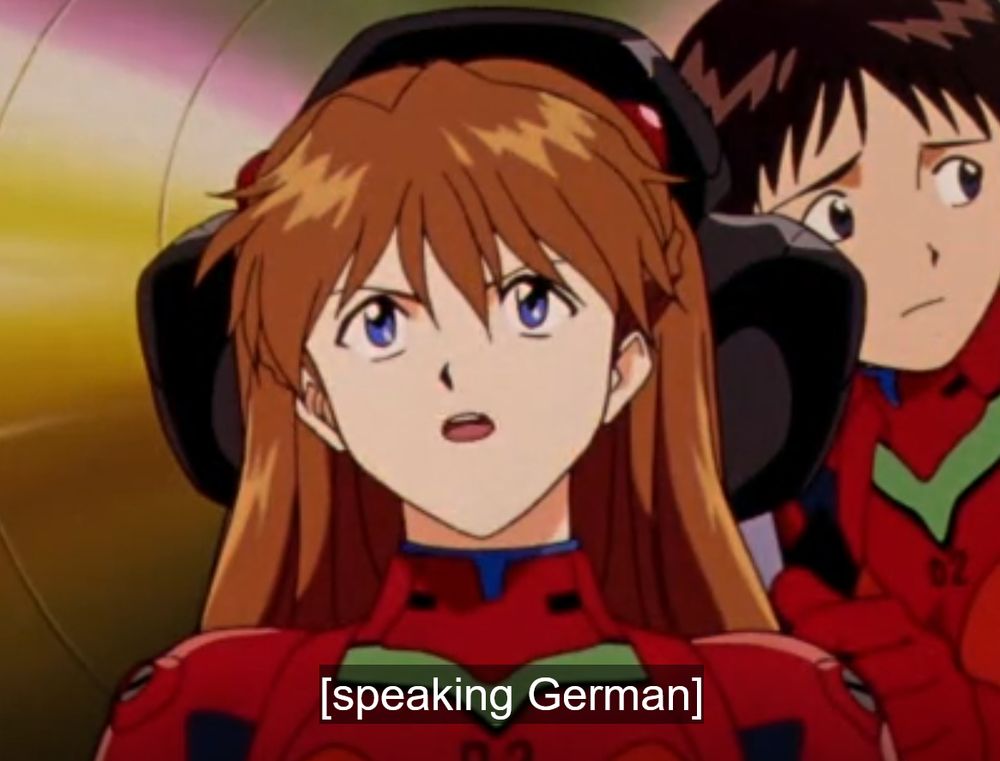 An image taken from Neon Genesis Evangelion of Asuka speaking german. The subtitles do not translate what she says and instead just read "[speaking German]", ruining the whole point of what subtitles are there for.