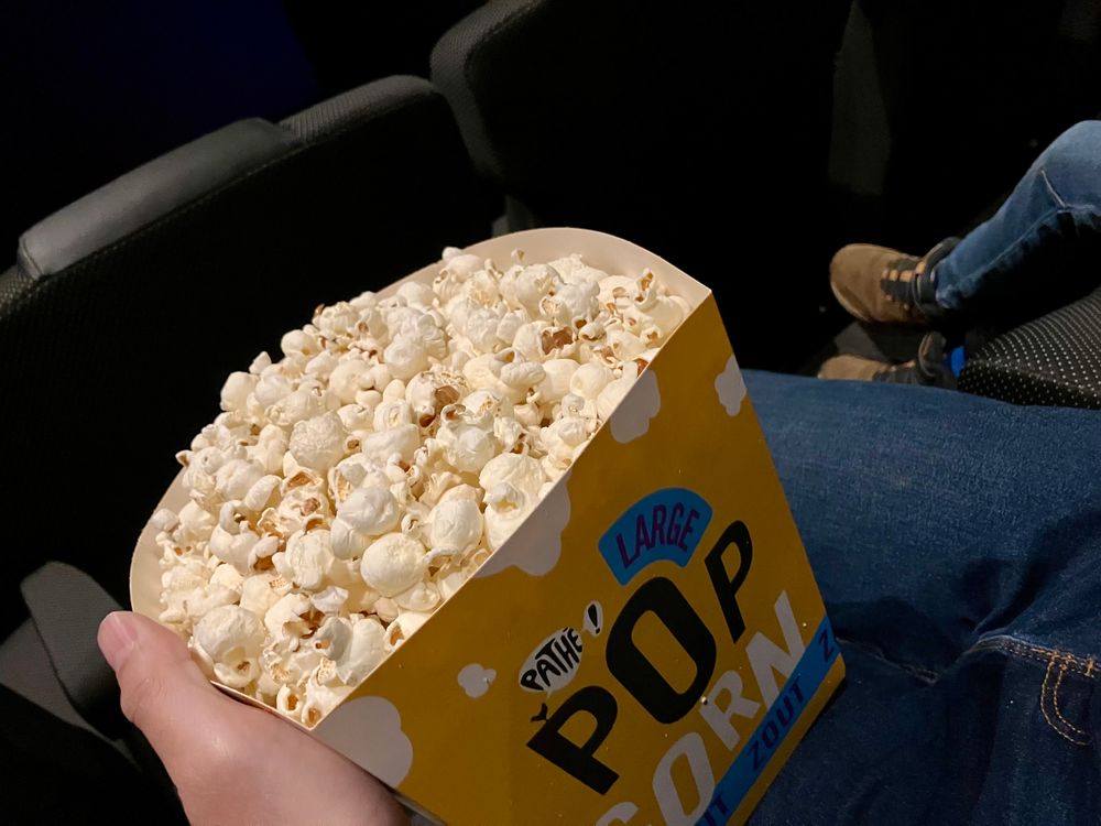 Popcorn. There’s a partial kid in the background