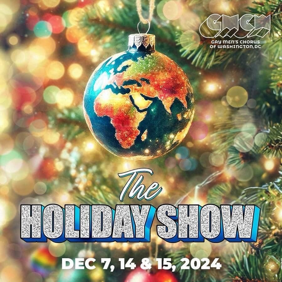A glittery ornament of the globe hanging on a Christmas tree to promote The Holiday Show 