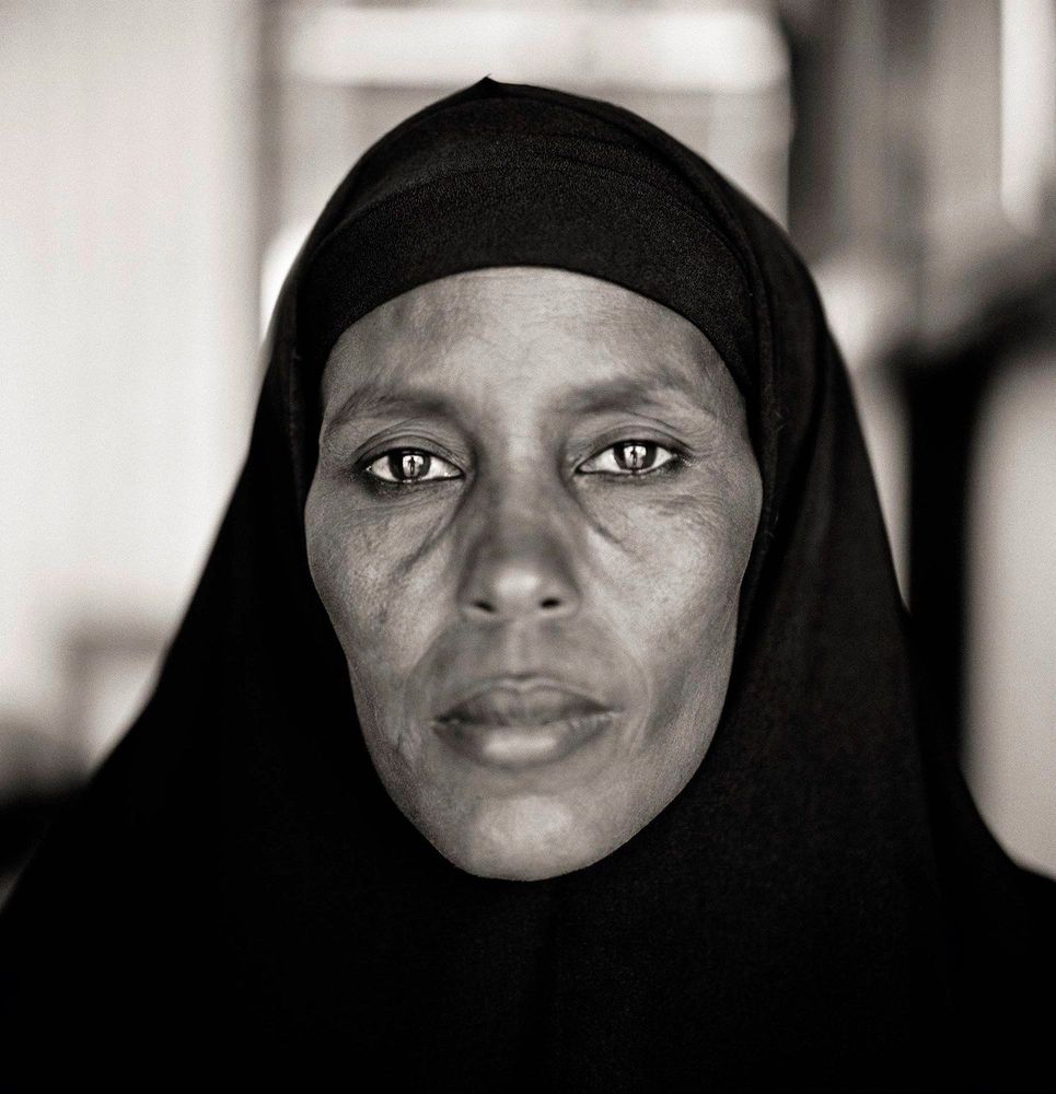 Fazal Sheikh (b. 1965) Abshiro Aden Mohammed, Women's Leader, Somali Refugee Camp, Dagahaley, Kenya, from the series A Camel for the Son, 2000