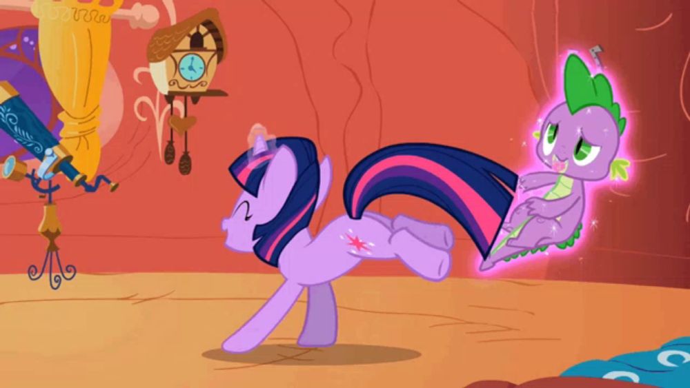 twilight sparkle and spike from my little pony are dancing together