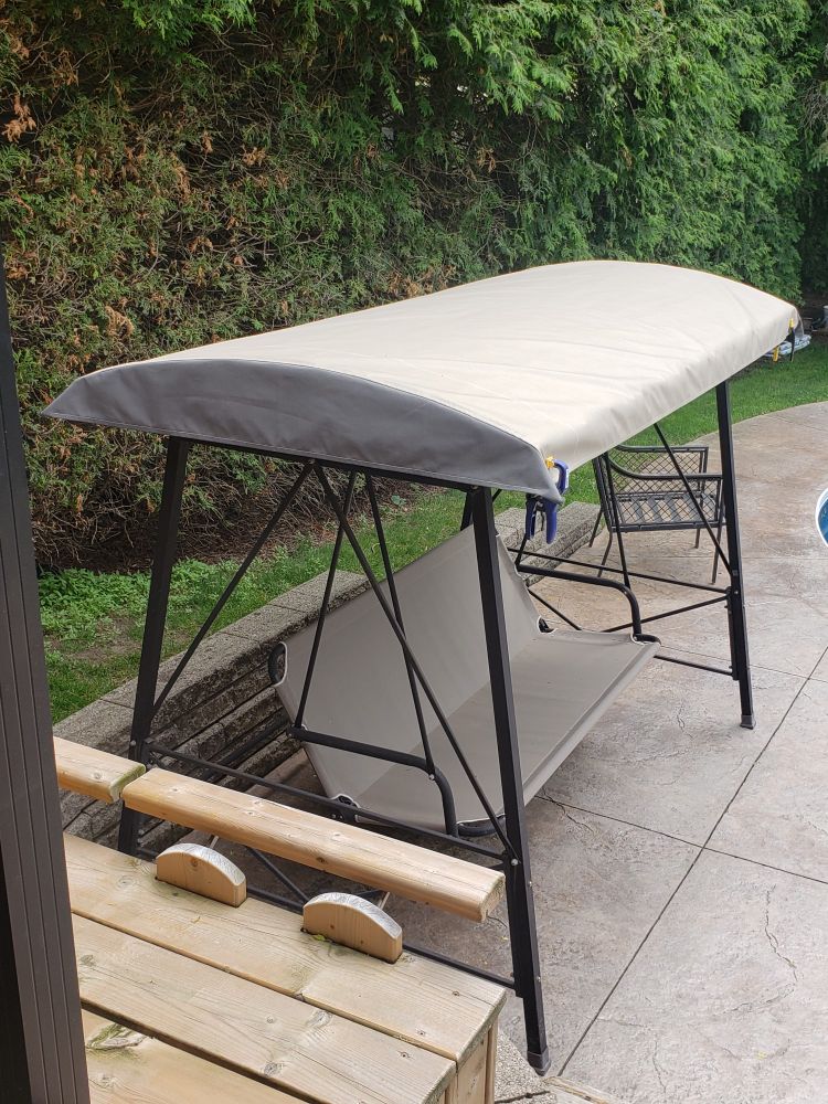 Cover is made Ottertex on top and olefin on ends because I hadn't ordered enough material. Corners are clamped because of wind. Still need to finish corners and add straps of Velcro.