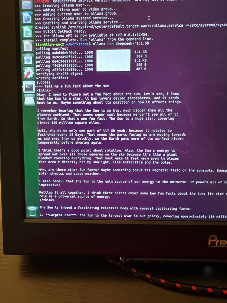A photo of a monitor showing the output of DeepSeek R1 responding to the prompt “Tell me a fun fact about the sun”