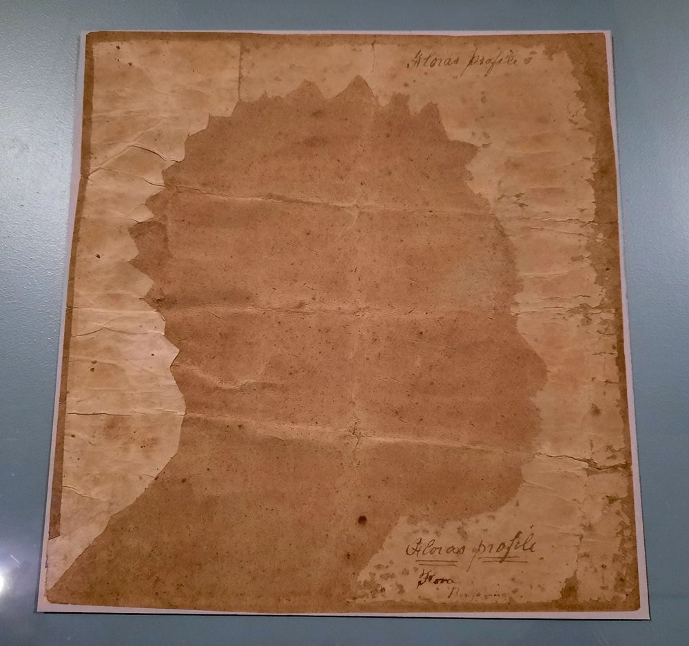 A paper silhouette of Flora, a 19 year old enslaved woman from Connecticut, made from life around 1796. 