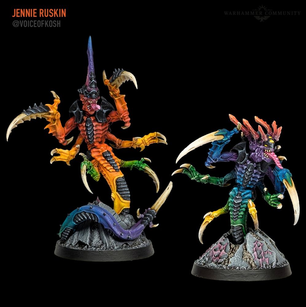 Two Raveners from the Kill Team Typhon box painted in blended rainbow colours.