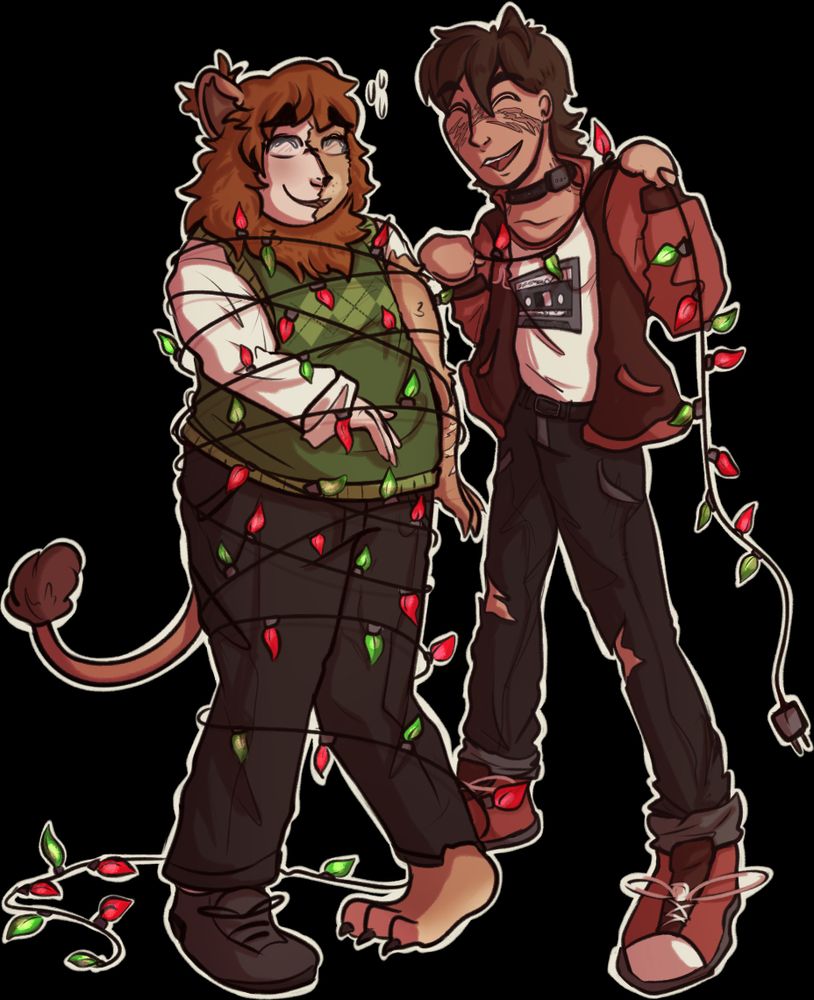 Ricky laughing with Mike while tangled up in Christmas lights.