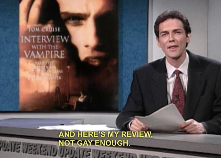 screenshot of anchor on weekend update from a saturday night live skit captioned: AND HERE’S MY REVIEW, NOT GAY ENOUGH.