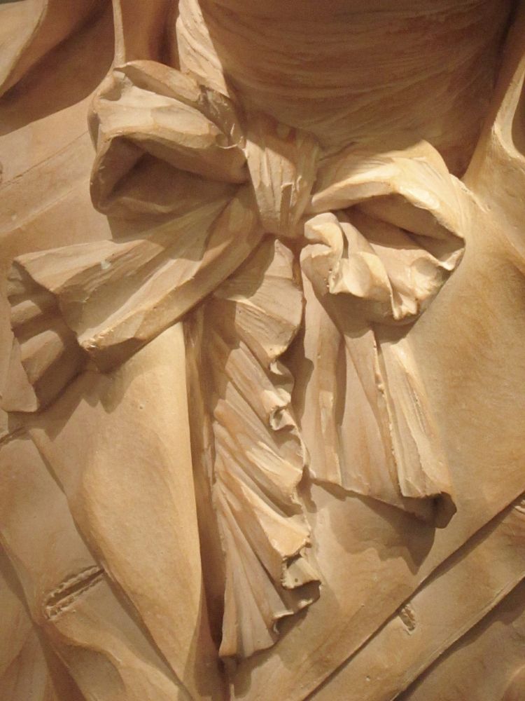 Detail of cast of Claude-André Deseine's 1791 bust of Maximilien Robespierre (Conciergerie, Paris), showing bow-tied cravat and shirt frill. The original, modelled in terracotta, is in the Musée de la Révolution in Vizille.