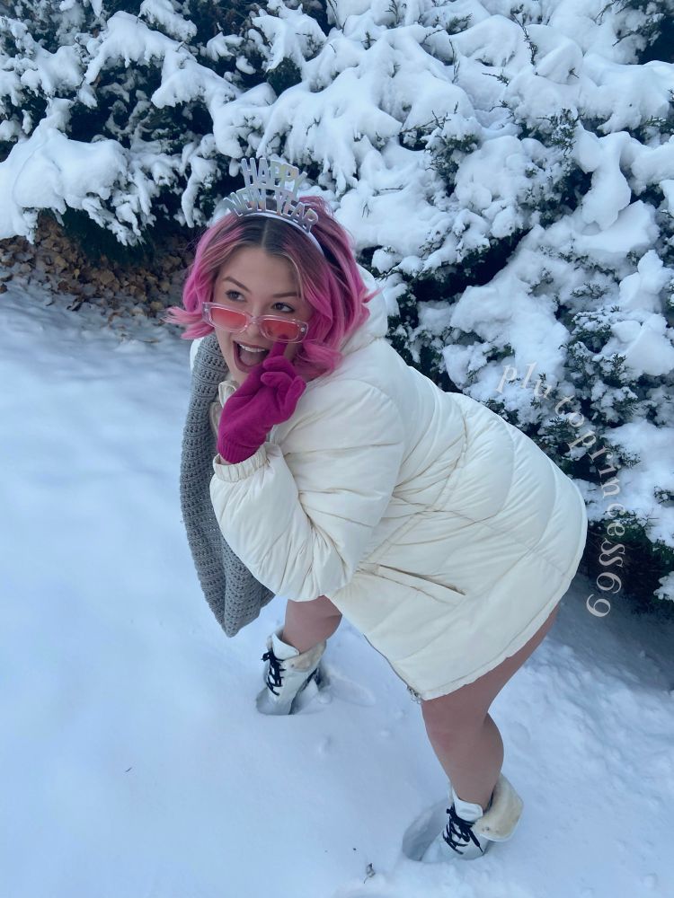 Pluto with pink hair in the snow