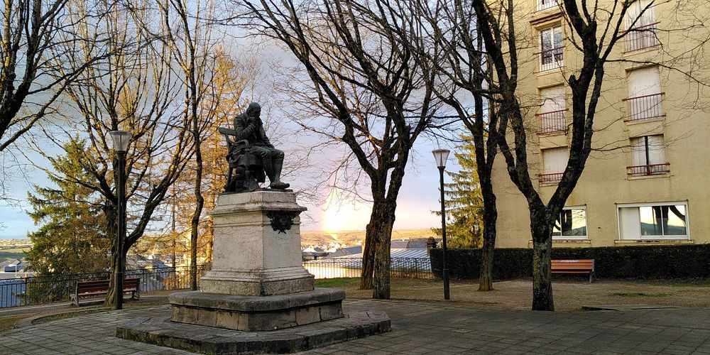 Statue of local writer, at viewpoint over the south of the city