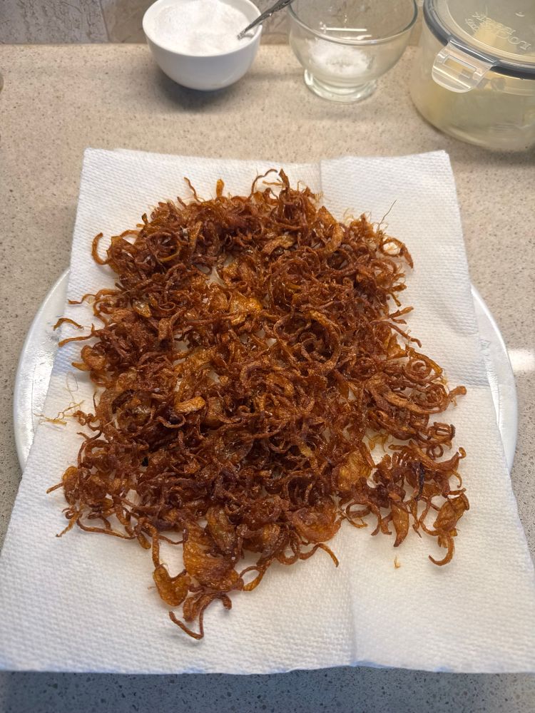 Golden brown and delicious fried onions. They took way too long to cook. 