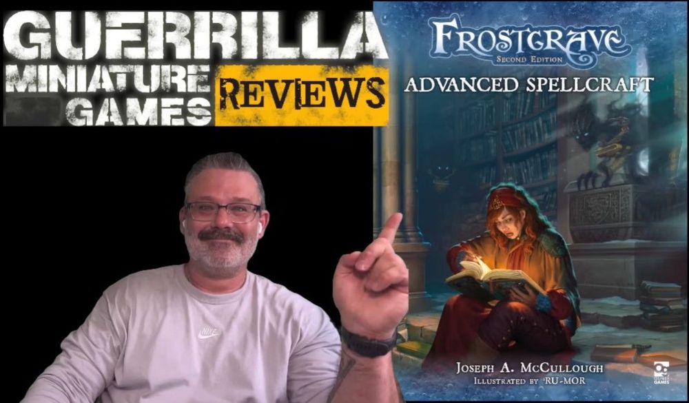 The thumbnail of the Guerrilla Miniature Games review of Frostgrave: Advanced Spellcraft on YouTube, showing Ash Barker pointing at the game's cover.
