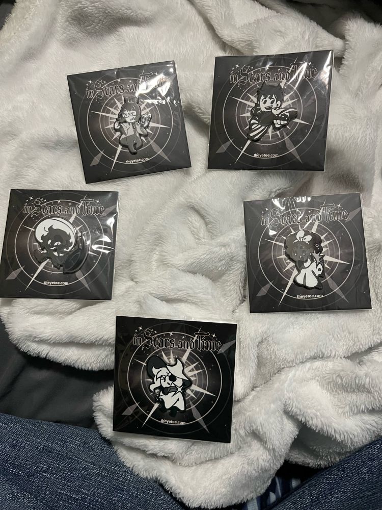 Five enamel pins, each one of the main five characters from the game “In Stars And Time”