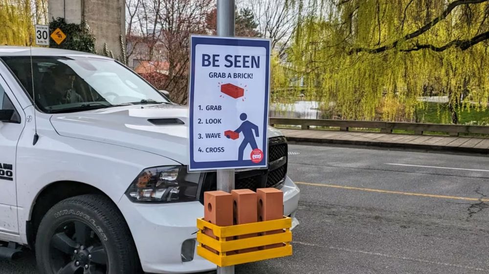 Our "be seen, grab a brick" stunt at the Granville Island crosswalk