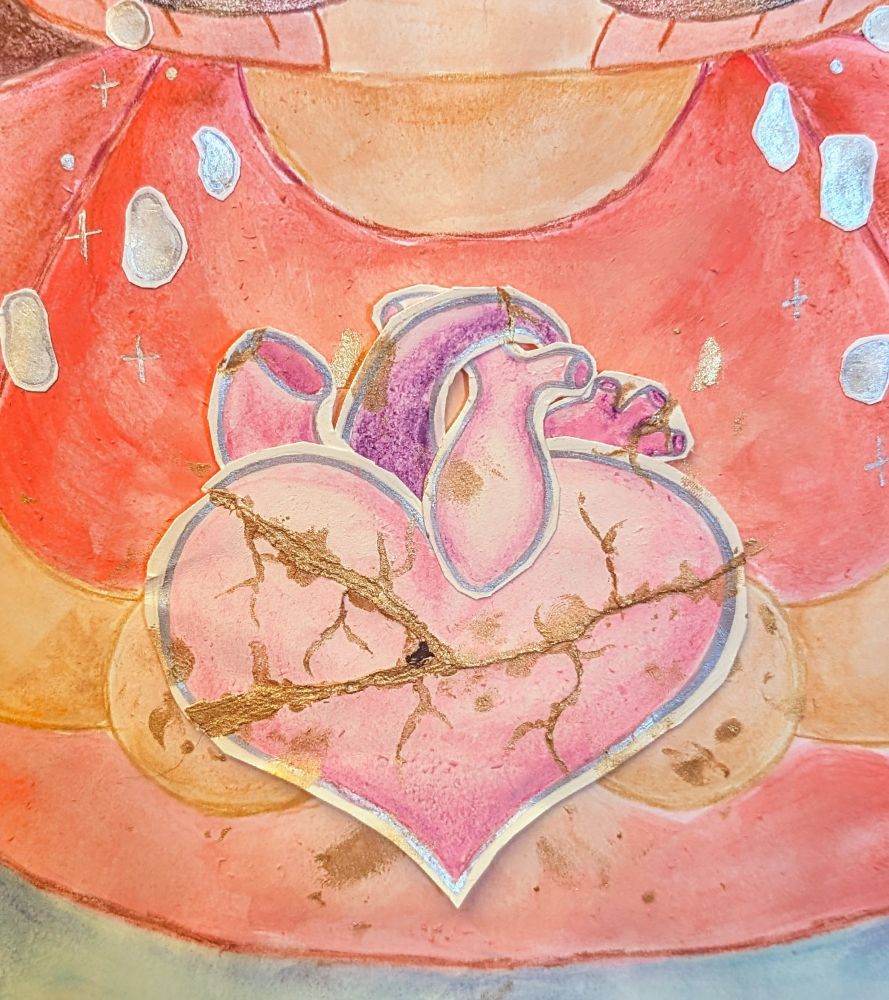 A cutesy anatomical esk heart ripped and glued messily back together with gold in an attempt to make it all better 