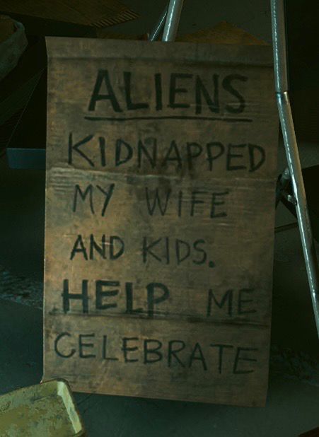 A screen capture from Cyberpunk 2077 on Switch 2. A cardboard sign that says, “Aliens kidnapped my wife and kids. Help me celebrate.”
