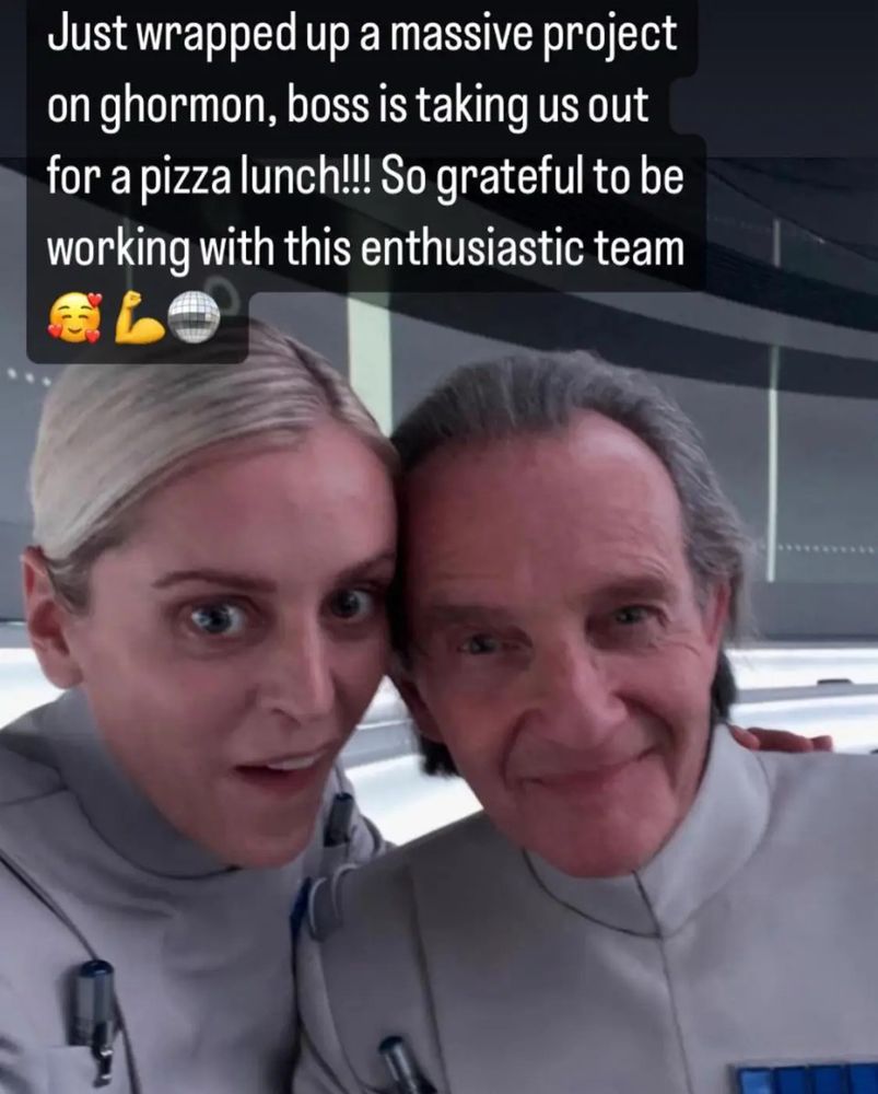 Dedra Meero and Lio Partagaz in their Star Wars uniforms taking a selfie and smiling. The caption reads "Just wrapped up a massive project on ghormon, boss is taking us out for a pizza lunch!!! So grateful to be working with this enthusiastic team"