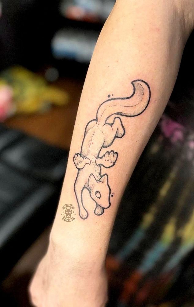 A winged fox creature tattoo

