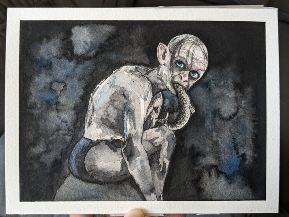 watercolor painting of gollum with a fish in his mouth