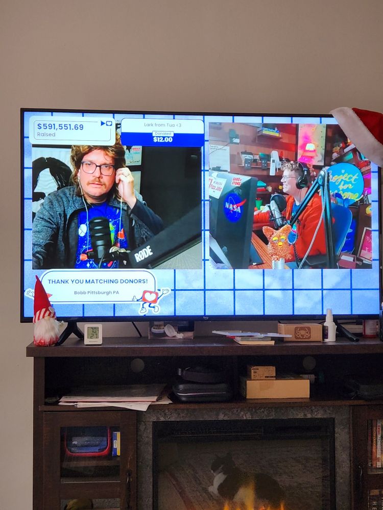 A picture of a TV screen with P4A including John and Hank Green 