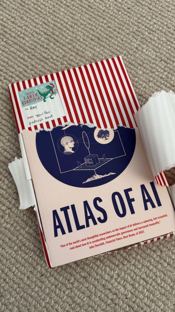 Partially unwrapped Christmas present - The Atlas of AI book