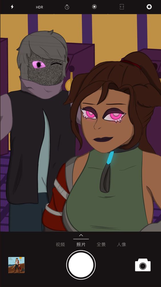 A selfie showing the old design of ItsRenrie, a dark skinned woman with canine ears, and the Instable One, a humanoid looking greyish boy, taking a selfie. The picture shows the user interface of a mobile app camera.