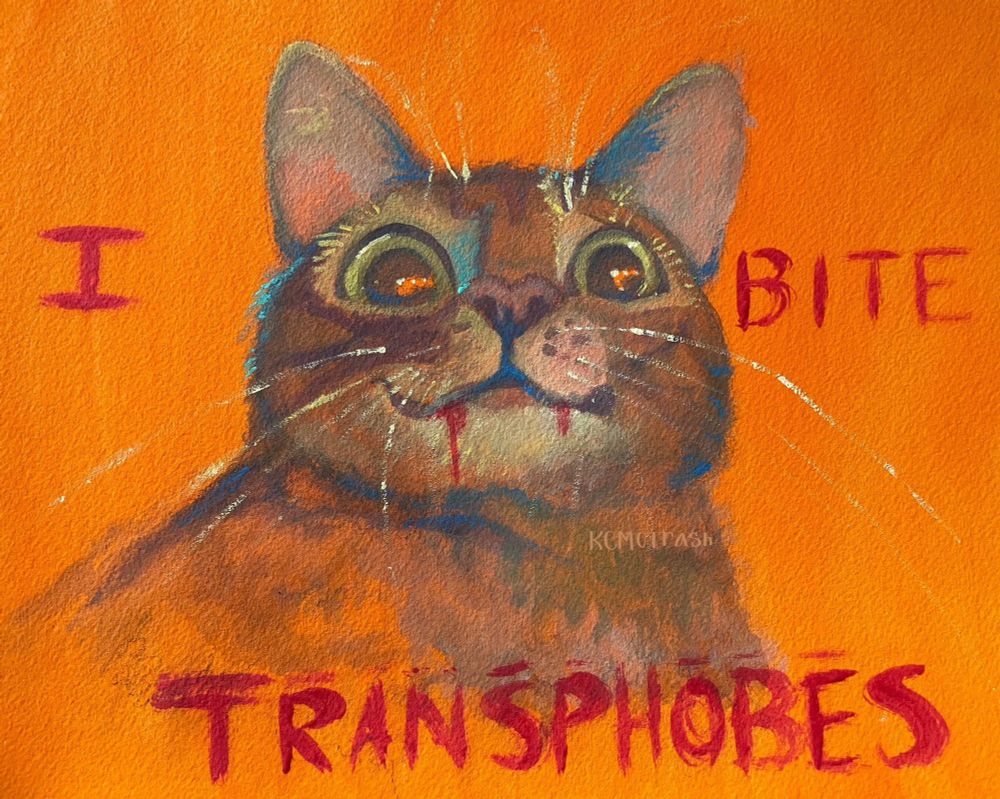 A painting of a black and brown tabby. They have blood dripping from their mouth. “I bite transphobes” is written.