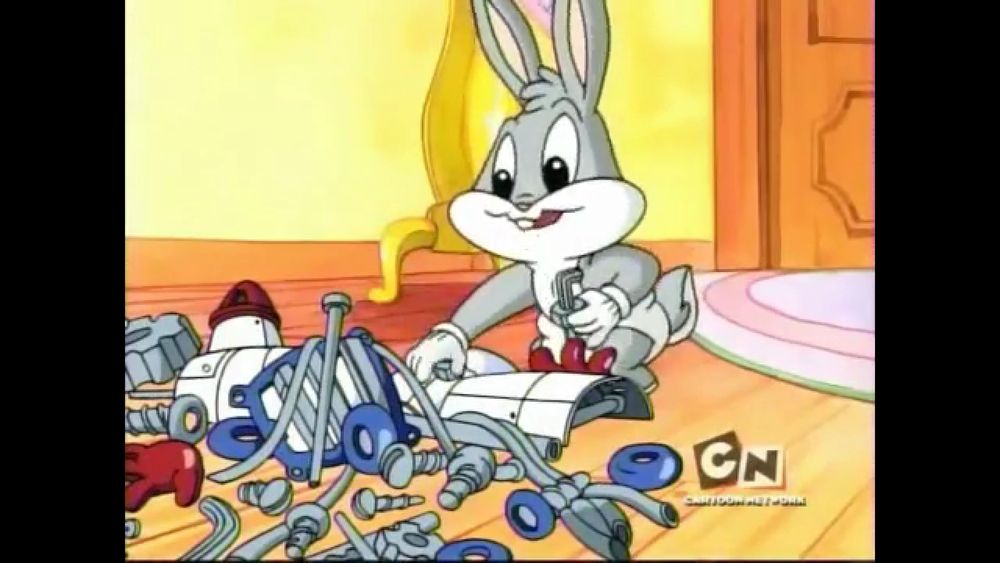 Bugs gets to work trying to assemble his new toy!