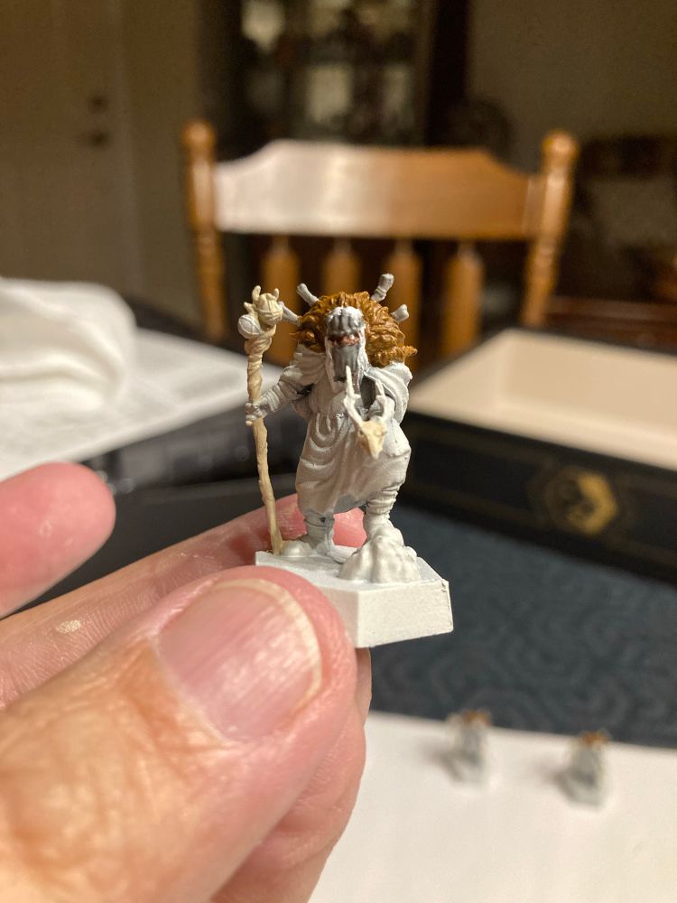 A partially painted miniature.