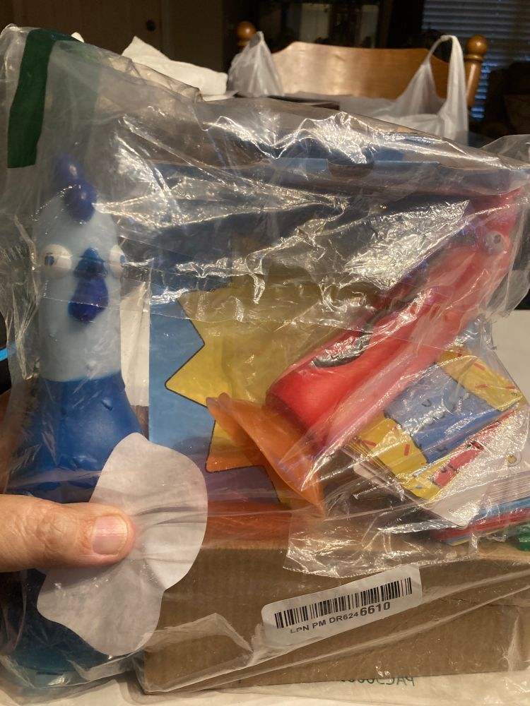 A blue chicken and a pink hot dog in a plastic bag. They’re perfectly fine, thank you.